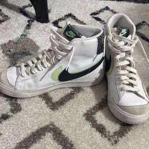 Nike White High-Top Sneakers with Black and Lime Swoosh